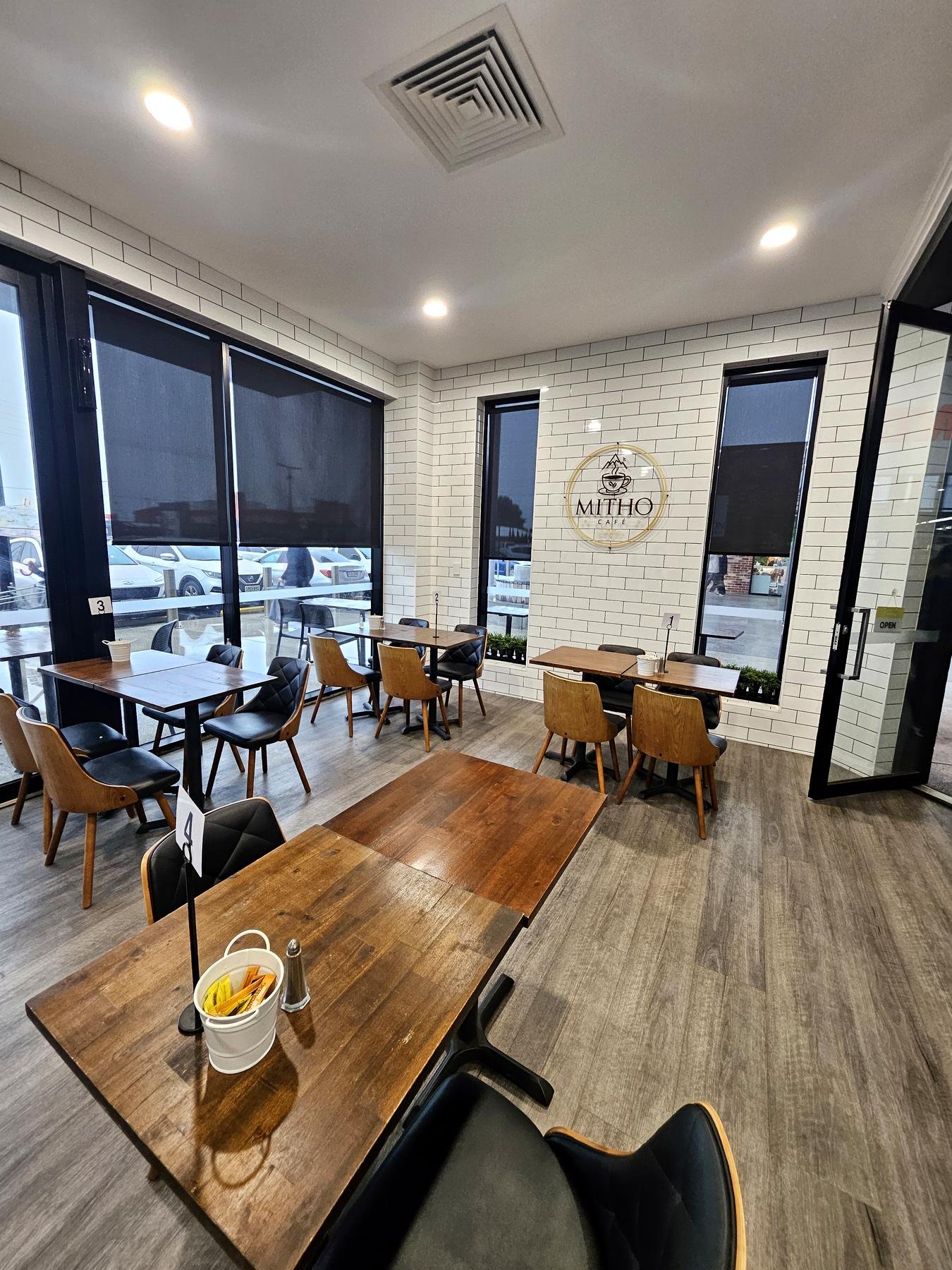Sunscreen roller blinds in a cafe